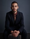 I was born for the corporate world. Studio portrait of a stylish young businessman against a gray background. Royalty Free Stock Photo