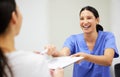 I was created to create beautiful smiles. a patient and assistant interacting in a dentist office. Royalty Free Stock Photo