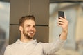 I was waiting for your call, Man beard with smartphone, urban background. Communication concept. Guy cheerful video Royalty Free Stock Photo