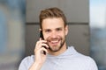 I was waiting for your call. Man beard with smartphone, urban background. Communication concept. Man with beard happy Royalty Free Stock Photo