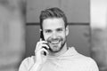 I was waiting for your call. Man beard with smartphone, urban background. Communication concept. Man with beard happy Royalty Free Stock Photo