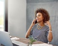 I was waiting for your call. a young woman talk on the phone while sitting at a desk at home. Royalty Free Stock Photo