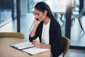 I went through the paperwork and all looks good. a young businessman talking on a cellphone in an office. Royalty Free Stock Photo