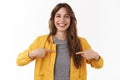 I what you look for. Attractive pleasant smiling happy young caucasian curly-haired girl pointing herself wanna Royalty Free Stock Photo