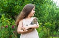 I will take care of you. small girl hold cute cat in hands. kid love her pet. human and animals. love and care. fluffy Royalty Free Stock Photo
