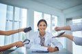 I wont let the pressure get to me. Portrait of a young female doctor looking calm in a demanding work environment.