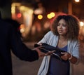 I wont let you have it. a .defenceless young woman having her bag stolen by a thief. Royalty Free Stock Photo