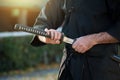 Iaido instructor draws his sword katana