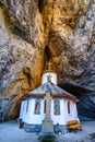 Ialomitei cave, Bucegi mountains, Saints Peter and Paul Church a Royalty Free Stock Photo