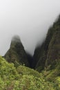 The Iao Needle mountain peak surrounded in clouds in central Maui, Hawaii Royalty Free Stock Photo