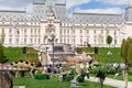 Dinosaurs park in the Palas Public Garden. Palatul Culturii or The Palace of Culture on background