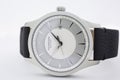 Ibach, Switzerland 31.03.2020 - The close up of Victorinox man watch stainless steel case leather strap white clock face