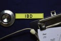 IBD text on sticky notes and stethoscope isolated on office desk. Heathcare/medical concept Royalty Free Stock Photo