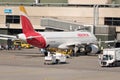 Iberia Airbus A320-214 jet at the gate in Zurich in Switzerland