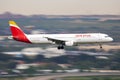 Iberia Airlines passenger plane at airport. Schedule flight travel. Aviation and aircraft. Air transport. Global Royalty Free Stock Photo