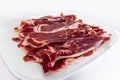 Iberian ham isolated in white background Royalty Free Stock Photo