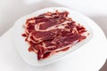 Iberian ham isolated in white background Royalty Free Stock Photo