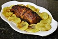 Iberian pork tenderloin on potato background