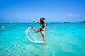 Ibiza beach girl splashing water in Balearics Royalty Free Stock Photo