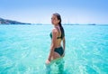 Ibiza bikini girl relaxed in clear water beach Royalty Free Stock Photo