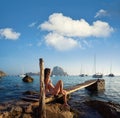 Ibiza cala d Hort girl pier sunset Es Vedra