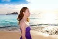 Ibiza girl at sunset in Cala Conta San Antonio