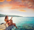 Ibiza girl taking smartphone photos Royalty Free Stock Photo