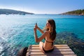 Ibiza girl taking smartphone photos Royalty Free Stock Photo