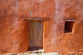 Ibiza grunge orange facade in Benirras beach