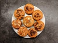 Ibiza, Islas Baleares, Spain  - November 11, 2021: top view of assorted fresh tasty muffins isolated on grey. Assorted with Delici Royalty Free Stock Photo