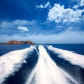 Ibiza Sa Conillera island from boat wake San Antonio