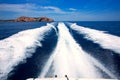 Ibiza Sa Conillera island from boat wake San Antonio