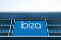 Ibiza airport sign with a cloudy sky background