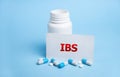 IBS text Irritable Bowel Syndrome on wooden cubes