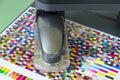 Icc profile, spectrophotometer robot measures color patches on Test Arch,