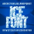 Ice alphabet font. Frozen letters and numbers on blue background.