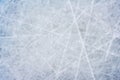 Ice background with marks from skating and hockey, blue texture of rink surface with scratches Royalty Free Stock Photo