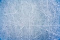 Ice background with marks from skating and hockey, blue texture of rink surface with scratches Royalty Free Stock Photo