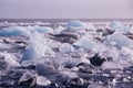 Ice blocks on a black sand beach