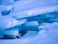 Ice blocks covered with snow at Frozen Lake Baikal Royalty Free Stock Photo