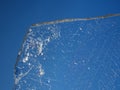 Ice board with cracks and bubbles. Flat ice piece