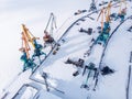 Ice bound frozen port for transshipment of coal from polar mines Container cargo ship loading North Arctic doc, top Royalty Free Stock Photo