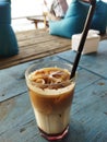 Ice brewed coffee at a beachside cafe at sunset