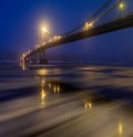 Ice is broken. Footbridge in winter city.