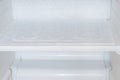 Ice buildup inside of a refrigerator. Royalty Free Stock Photo