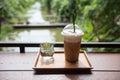 Ice cappuchino coffee at cafe garden Royalty Free Stock Photo