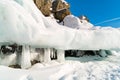 Ice cave with icicles at the mountain in Lake Baikal Royalty Free Stock Photo