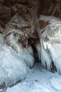 Ice cave, Icicles in the rocky caves, Lake Baikal in winter, Siberia