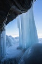 Ice cave, Icicles in the rocky caves, Lake Baikal in winter, Siberia