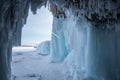 Ice cave, Icicles in the rocky caves, Lake Baikal in winter, Siberia